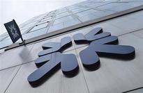 Britain to look at RBS split, start Lloyds sale soon