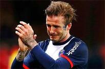 Tearful Beckham bids farewell to Paris